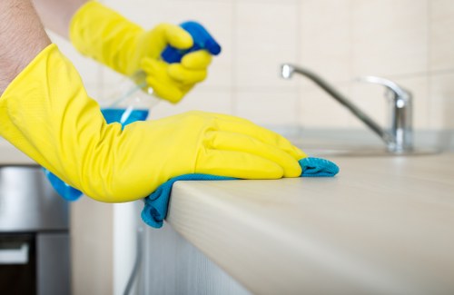 Upholstery stain removal on a couch using safe cleaner